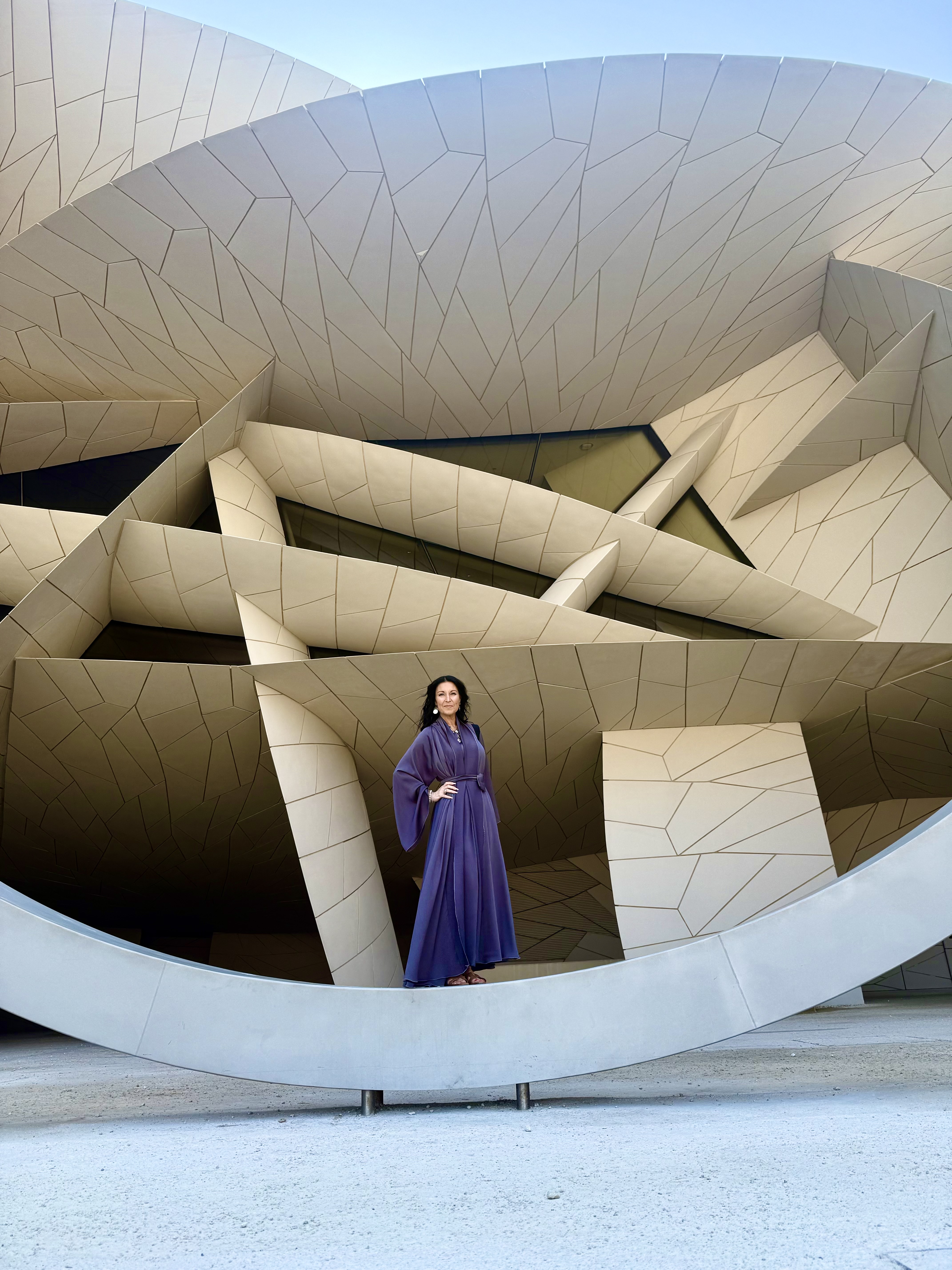 Client in purple dress at Qatar National Museum