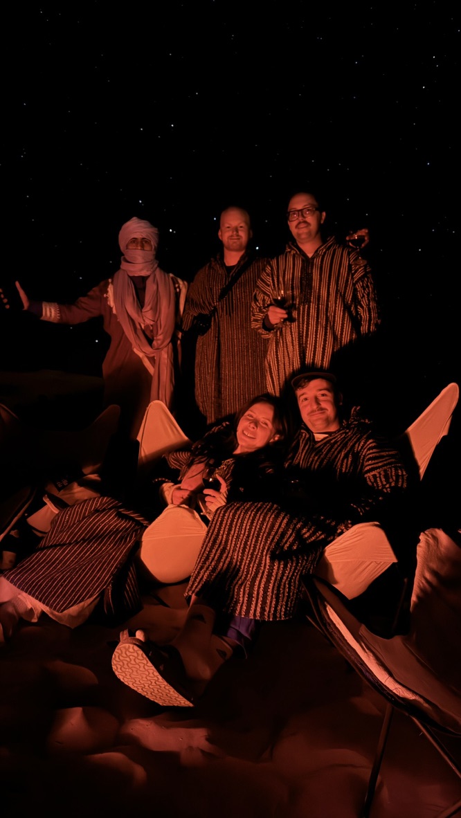Group stargazing in the Sahara desert